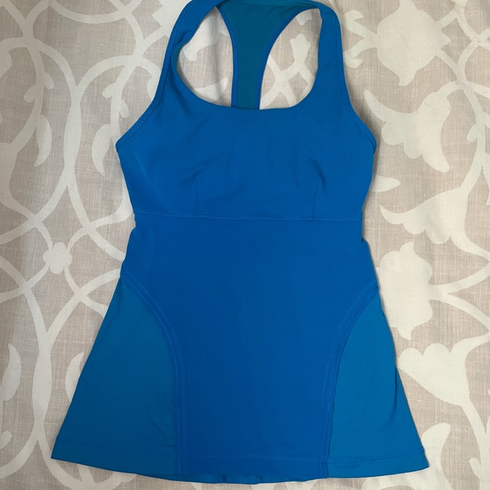 Sz 4 blue lulu top Good condition. Cute fit!